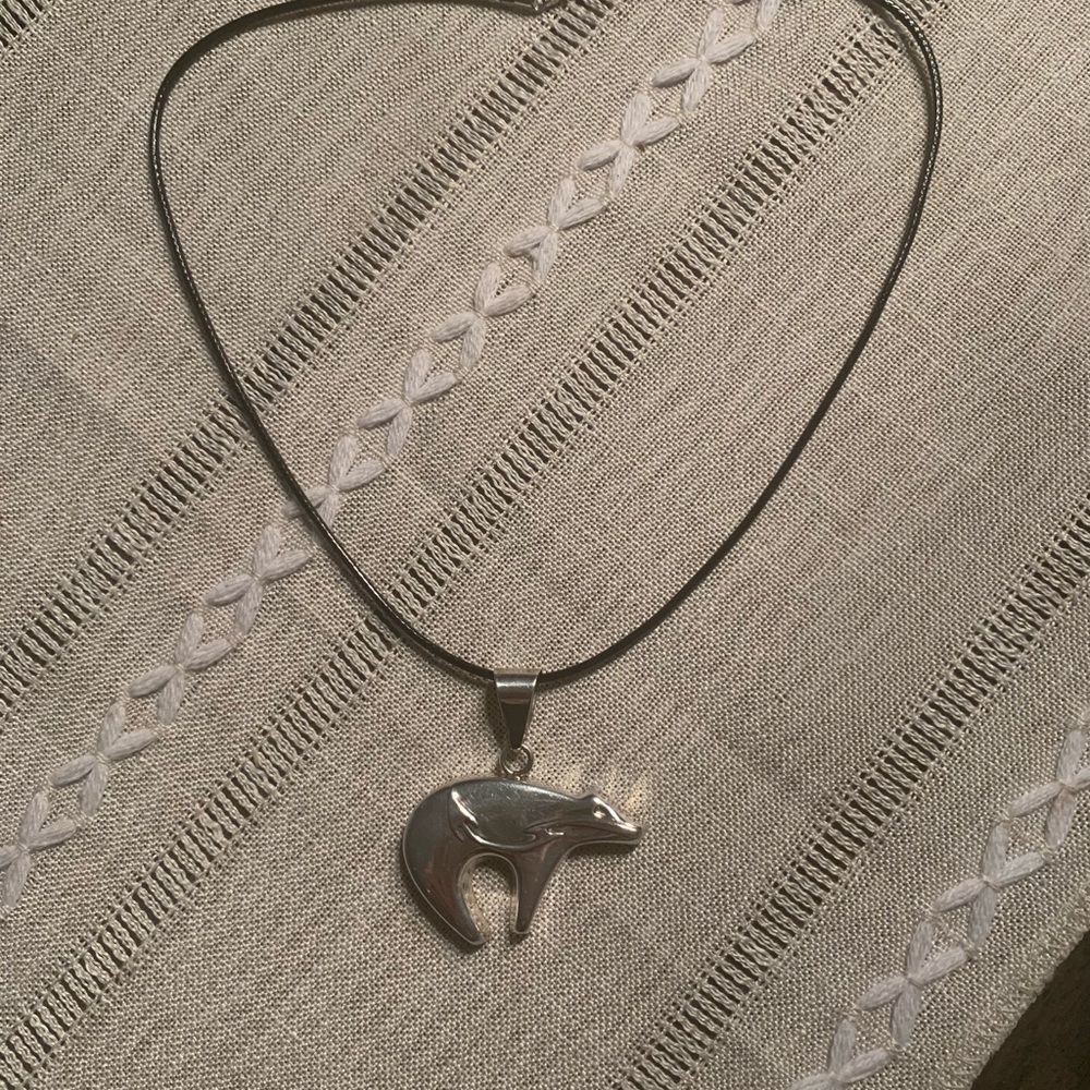 Sterling Silver Navajo Bear with Heartline Pendant on Leather Rope.